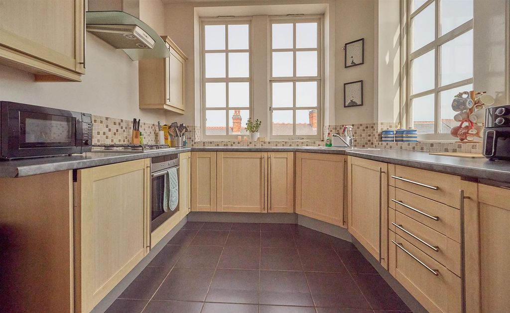 Property photo 3 of 10 Kitchen Area