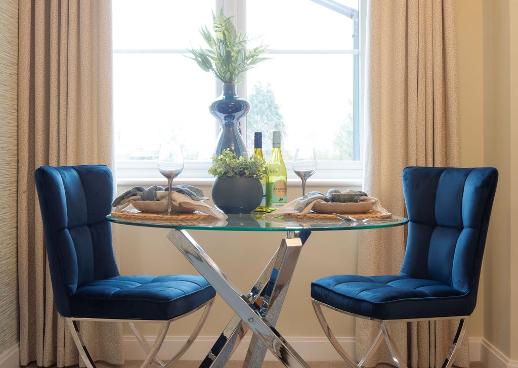 Property photo 3 of 19 A Table With Chairs And Glasses On It