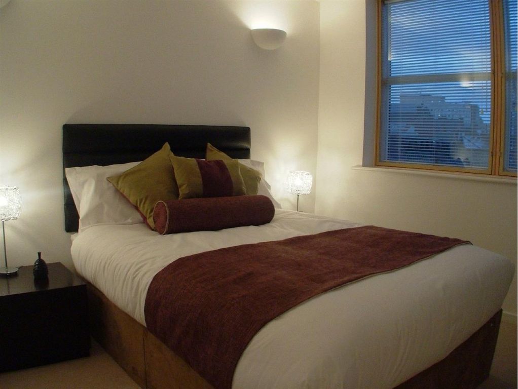 Property photo 3 of 9 Cozy Double Bedroom With Neat Bed And Bedside Lamp...