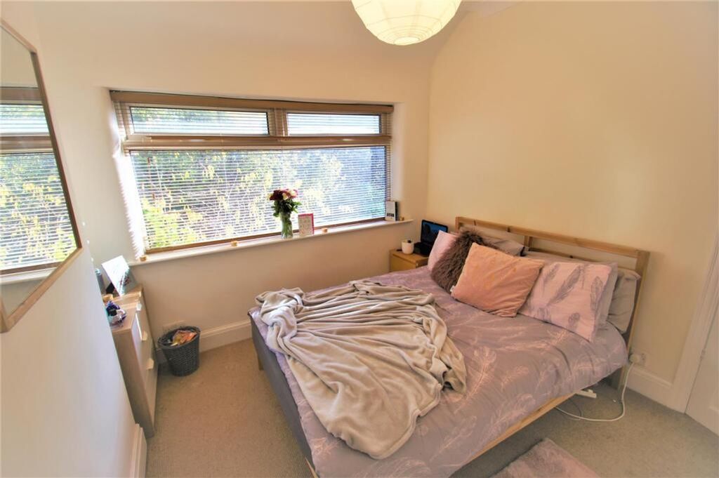 Property photo 2 of 13 A Cozy And Inviting Double Bedroom Featuring Ample...