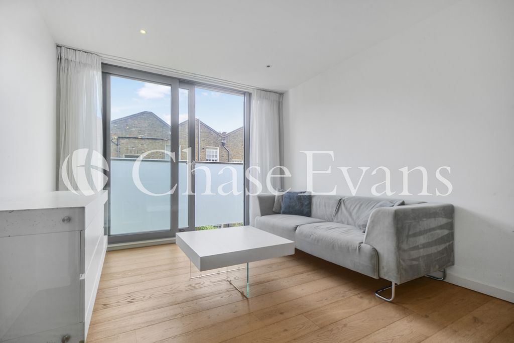 Property photo 3 of 16 Living