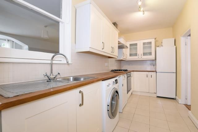 Property photo 2 of 12 Kitchen View
