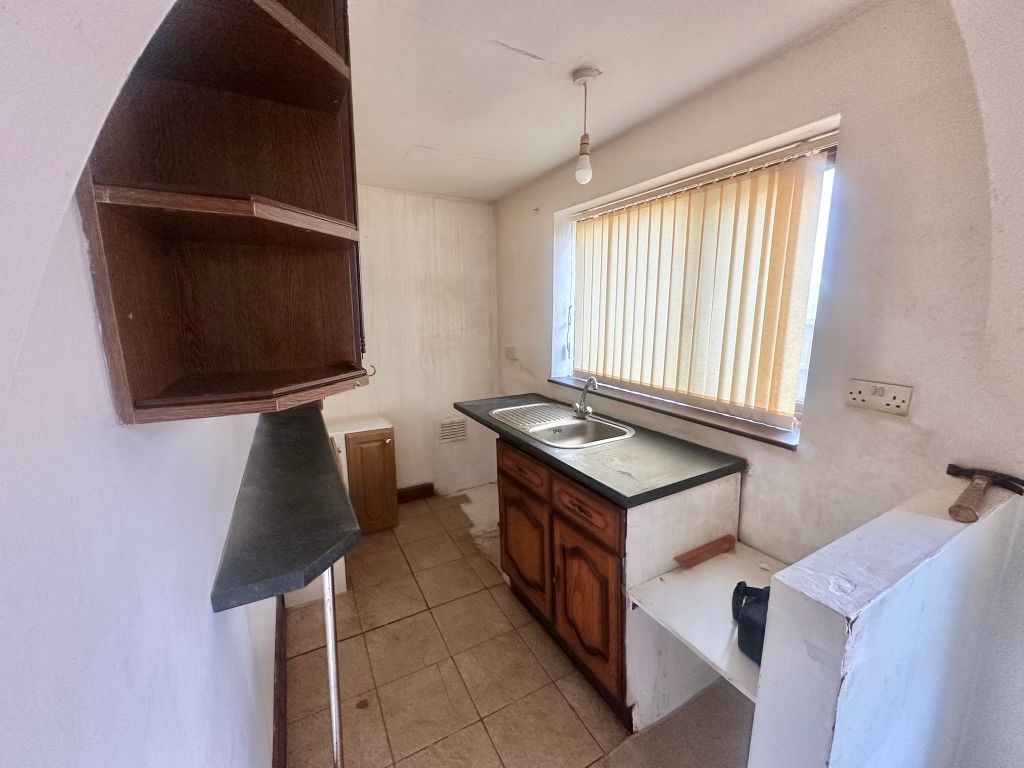 Property photo 3 of 9 3. Kitchen