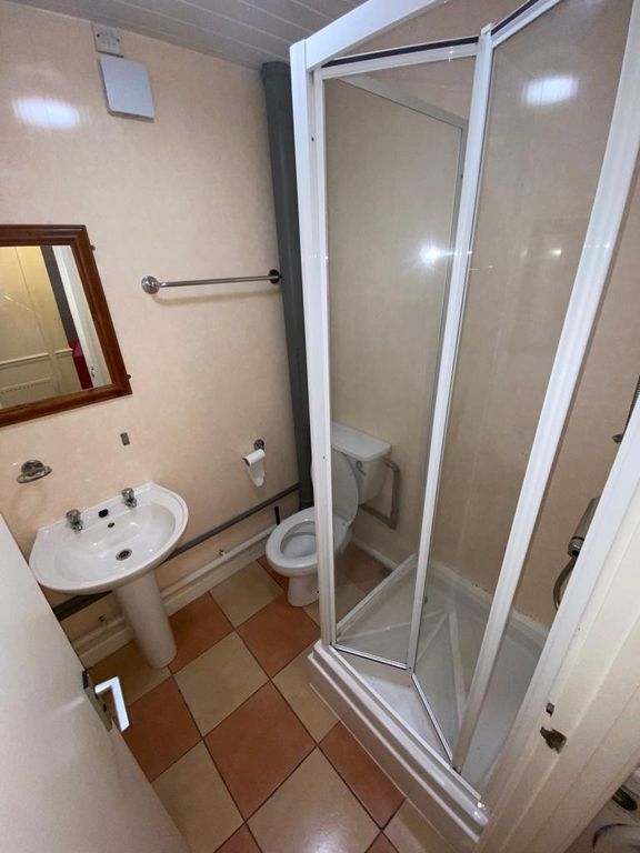 Property photo 1 of 8 Bright Bathroom With A Walk-In Shower And Mirror...