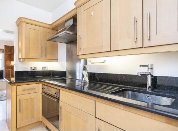 Property photo 2 of 8 Kitchen
