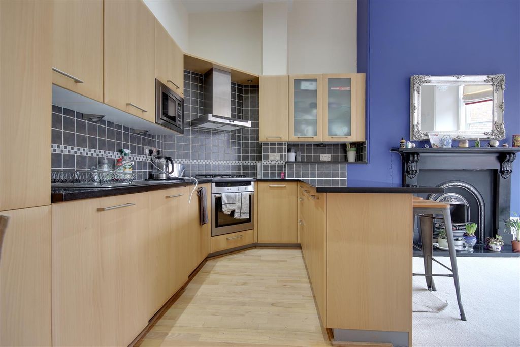 Property photo 3 of 6 Kitchen Area