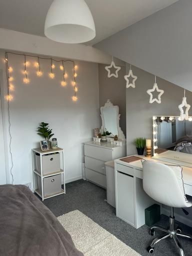 Property photo 1 of 22 A Well-Lit Bedroom Featuring Cozy Fairy Lights, A ...