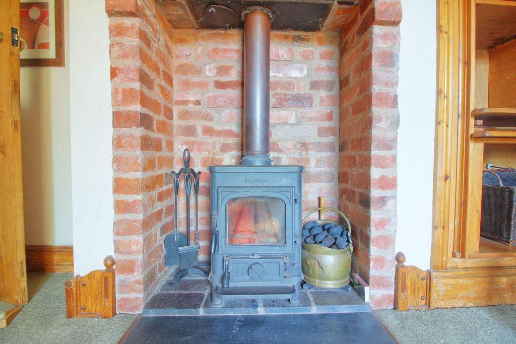 Property photo 3 of 20 Dining Room Fireplace