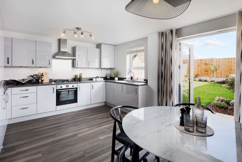Property photo 1 of 8 Open Plan Kitchen With Dining Area In The Maidstone 3 Bedroom Home