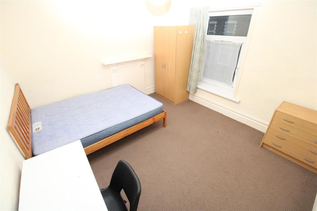 Property photo 2 of 10 Bright Bedroom With Ample Storage And Desk Space...