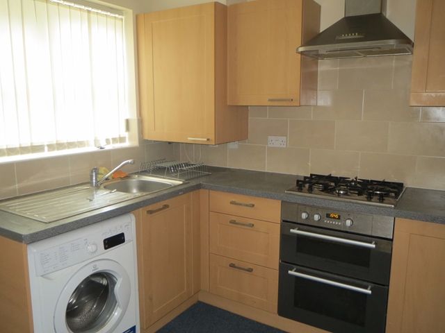 Property photo 2 of 11 Kitchen