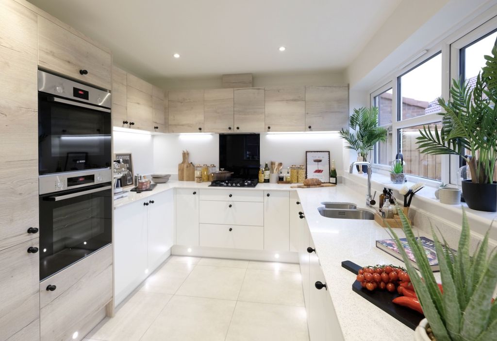 Property photo 2 of 13 Kitchen Area