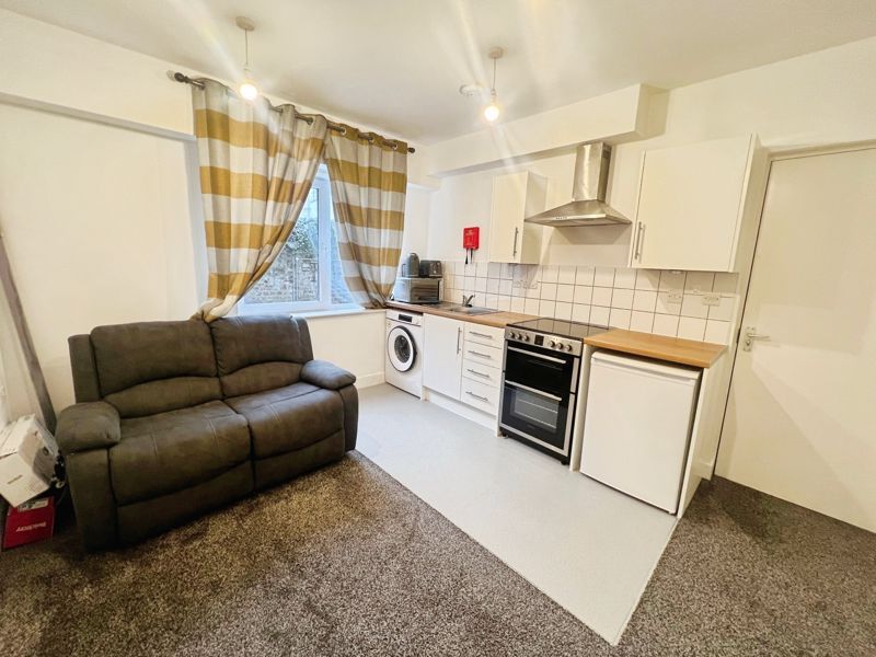 Property photo 3 of 9 Kitchen Living Area