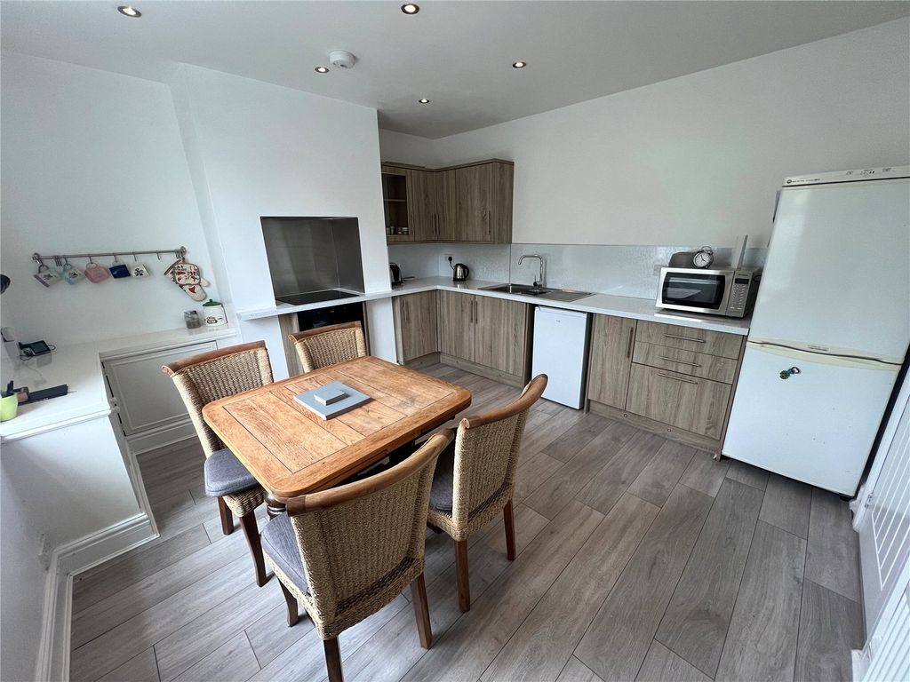 Property photo 2 of 14 Dining Kitchen