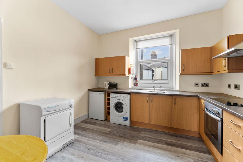 Property photo 3 of 12 Kitchen
