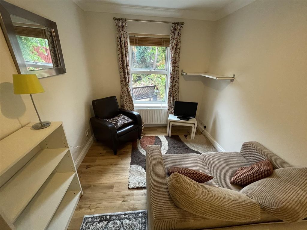 Property photo 2 of 10 Cosy Lounge With Wood Flooring And Natural Light...