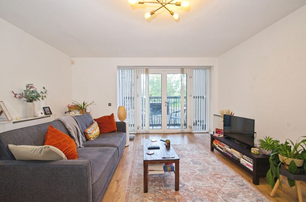 Property photo 3 of 17 Living Area
