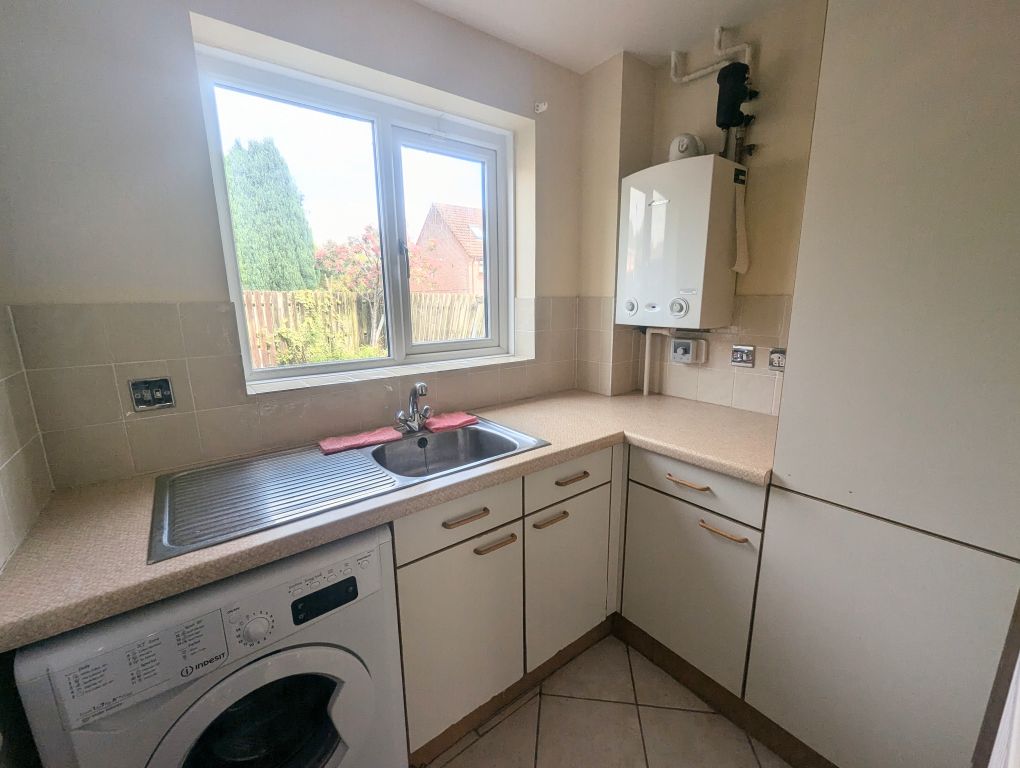 Property photo 2 of 7 Utility Room