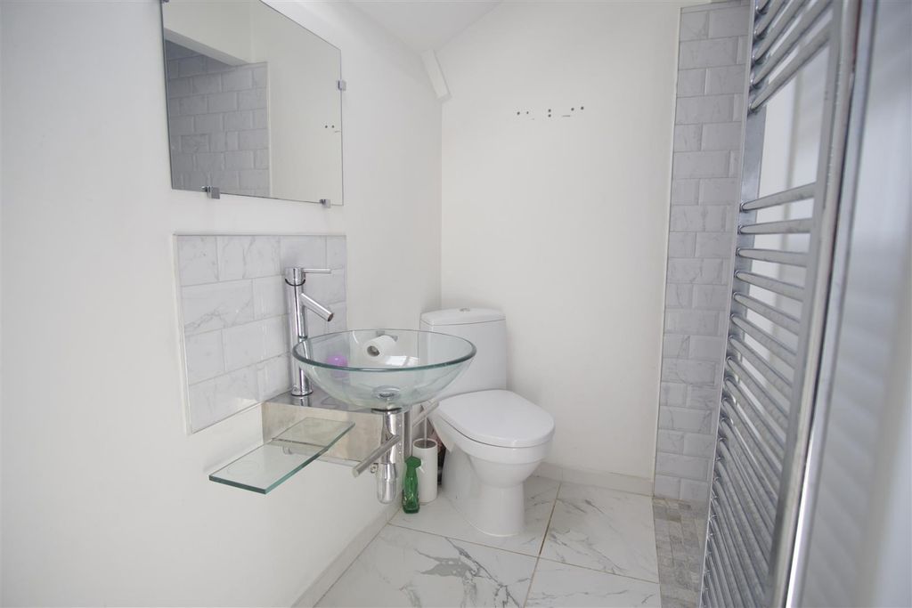 Property photo 3 of 11 Attic Bathroom