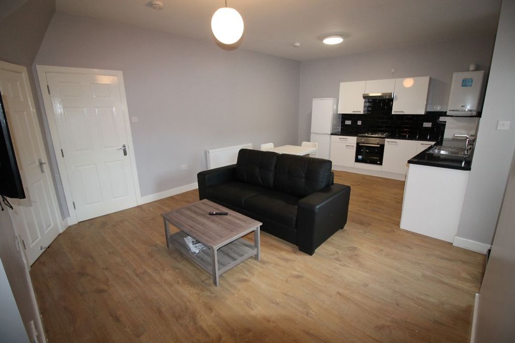 Property photo 1 of 11 A Contemporary Living Room Featuring Modern Furnis...