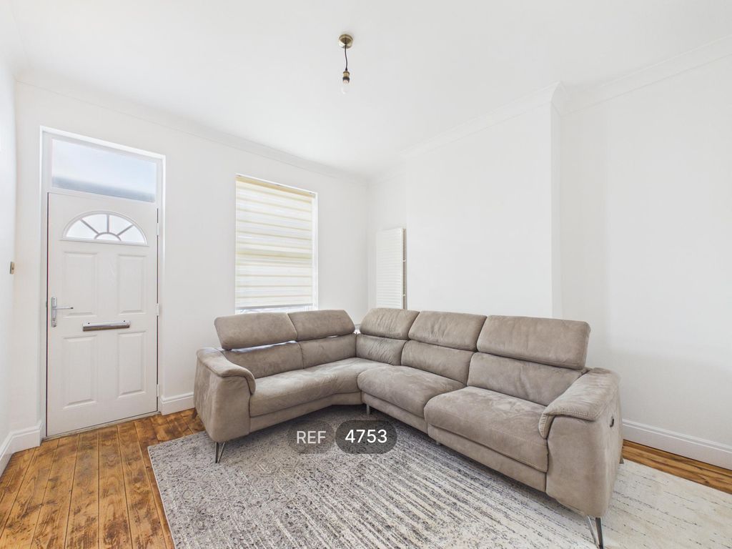 Property photo 2 of 12 Living Room