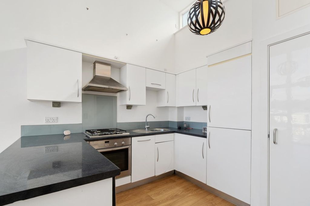 Property photo 3 of 12 Kitchen