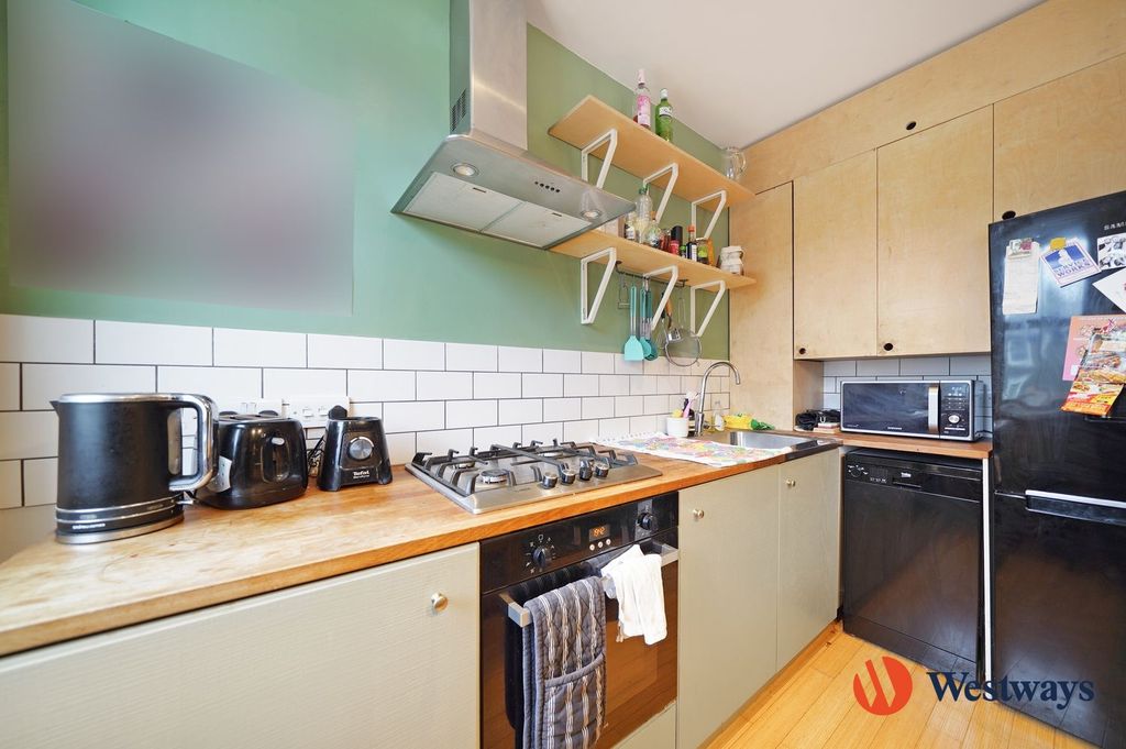 Property photo 3 of 8 Kitchen