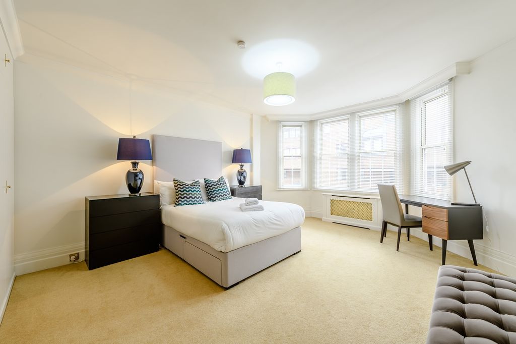 Property photo 1 of 23 Spacious Master Bedroom Featuring Large Windows Th...