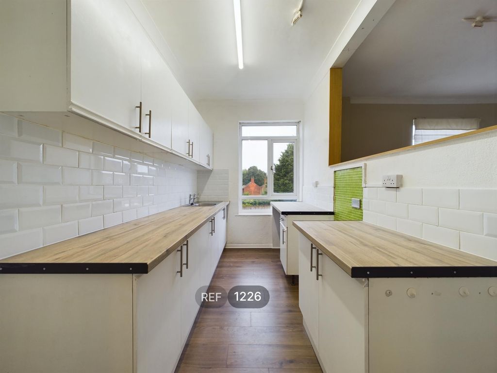 Property photo 1 of 8 Kitchen &amp; Living Area