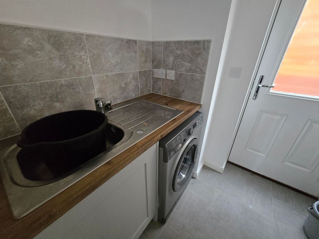 Property photo 2 of 8 Utility Room