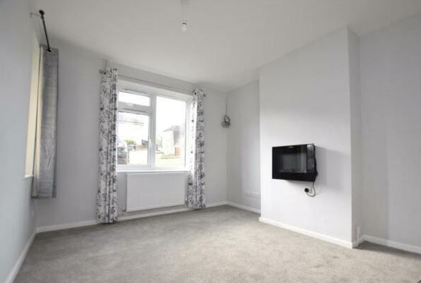 Property photo 2 of 8 Living Room