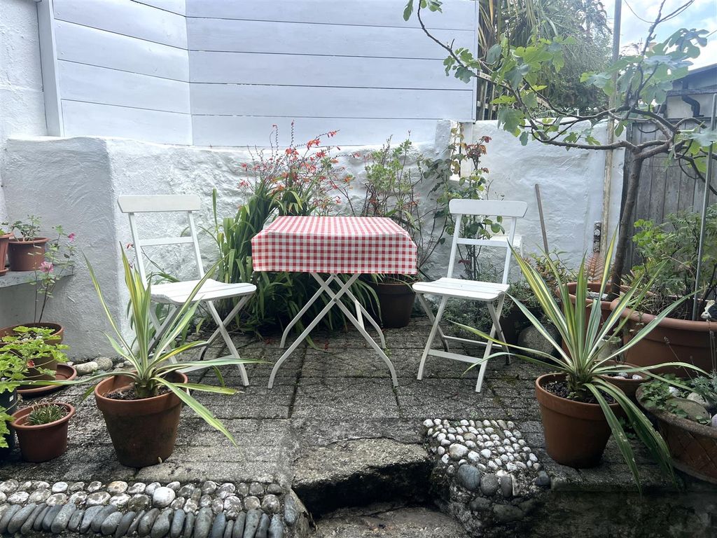 Property photo 2 of 12 Elevations &amp; Garden