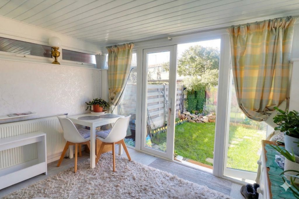 Property photo 1 of 12 Sunroom From The Kitchen