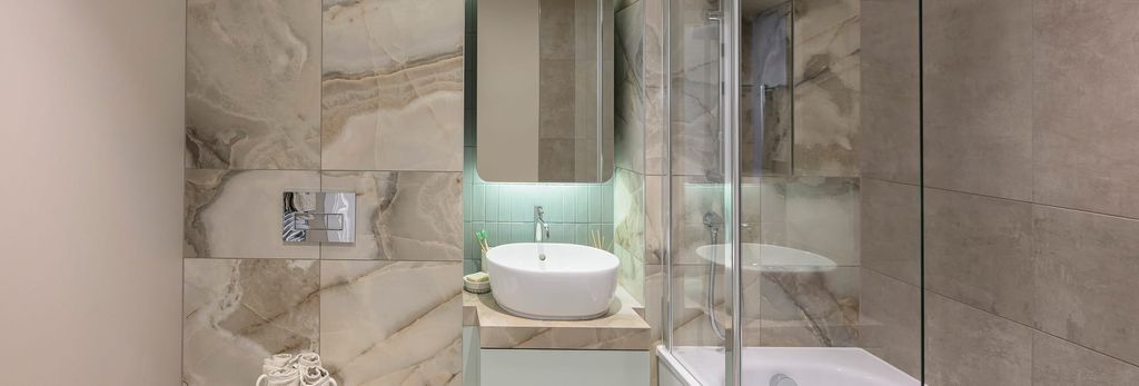 Property photo 3 of 5 Bathroom With Shower Over Bath, Wash Basin With Mirror.