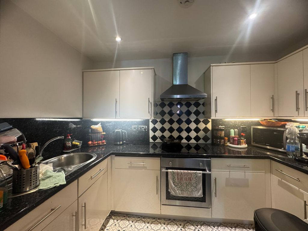 Property photo 3 of 6 Kitchen Area