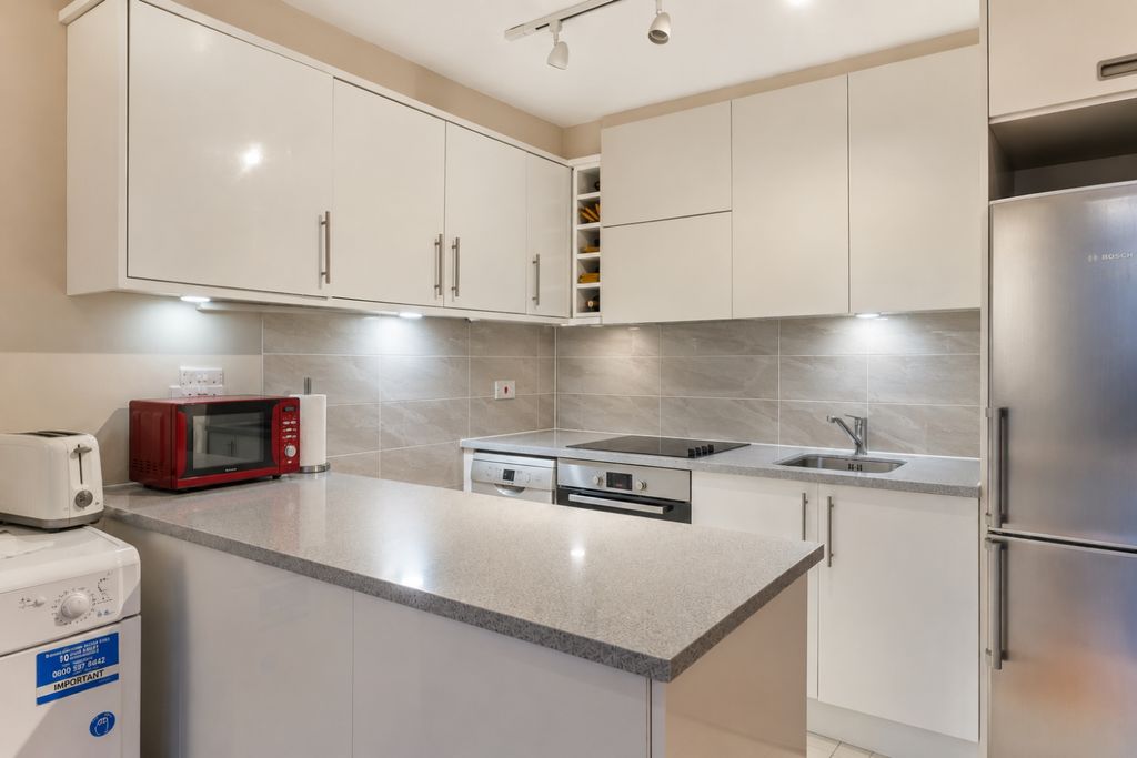 Property photo 2 of 9 Kitchen