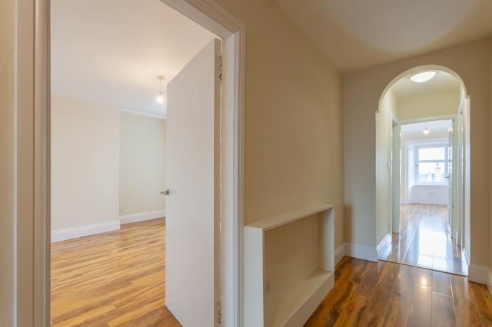 Property photo 3 of 11 Hallway Looking Into Bedroom And Living Room