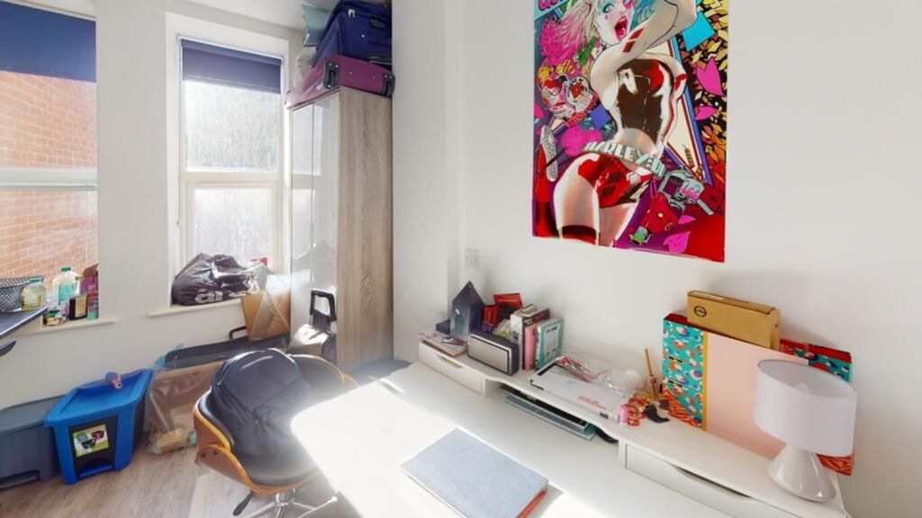 Property photo 1 of 4 A Vibrant Double Bedroom Featuring Ample Natural l...