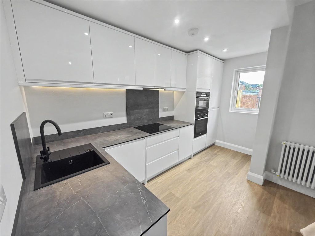 Property photo 3 of 13 Kitchen