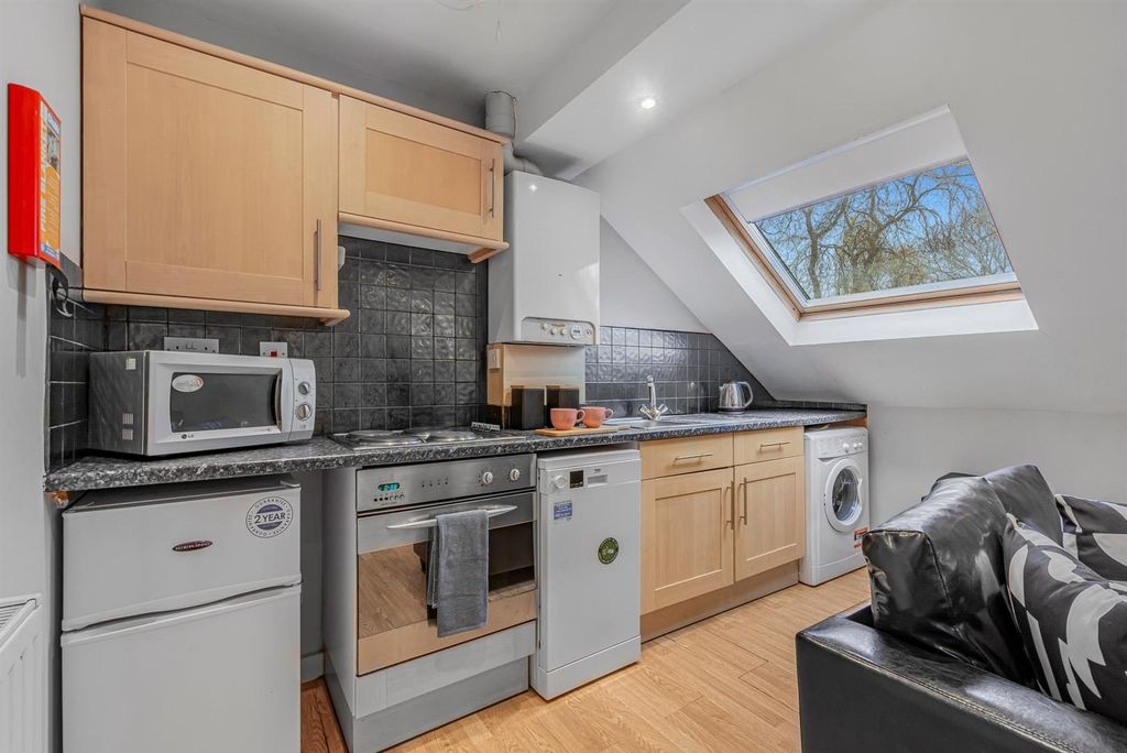 Property photo 2 of 9 Modern Kitchen With Skylight And Full Appliances...