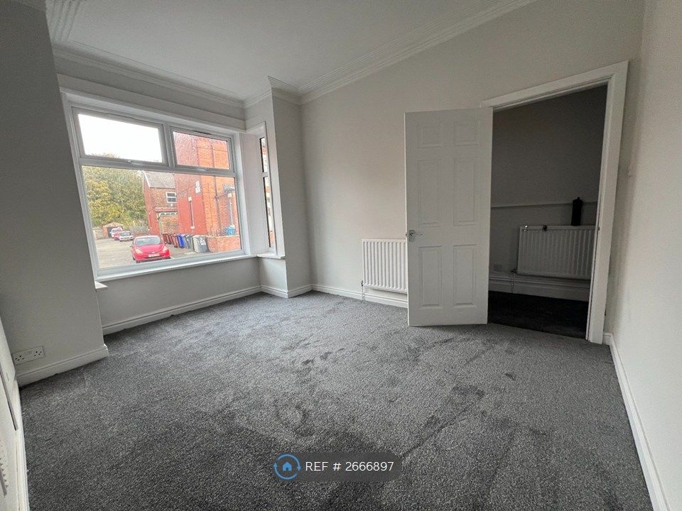 Property photo 3 of 8 Front Lounge