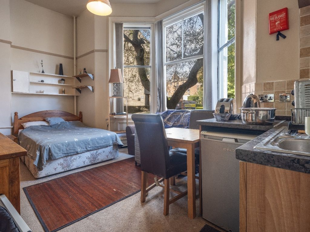 Property photo 1 of 7 Bright And Cozy Living Space Featuring A Large Bay...