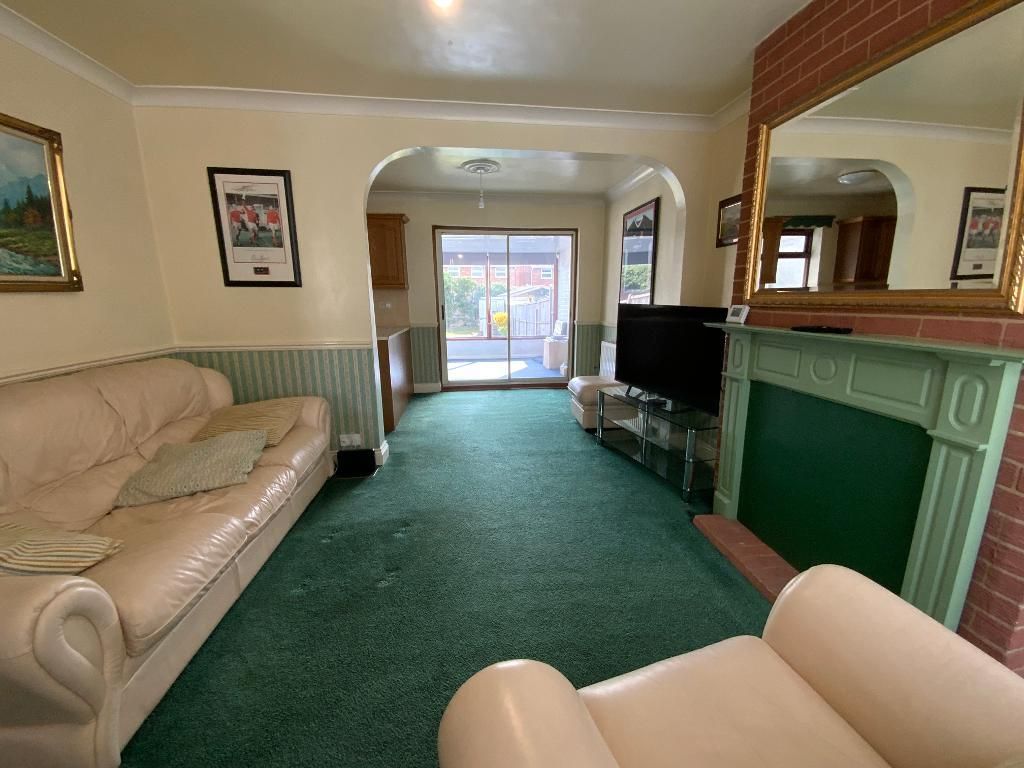 Property photo 3 of 11 Living Room 12'6 x 12'2