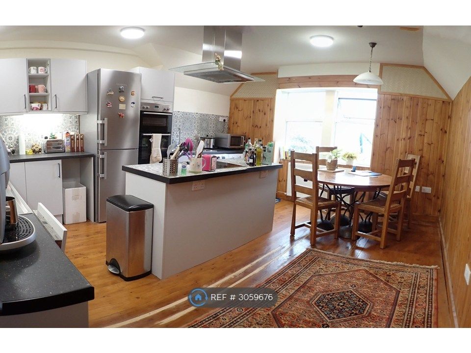 Property photo 2 of 11 Dining Kitchen