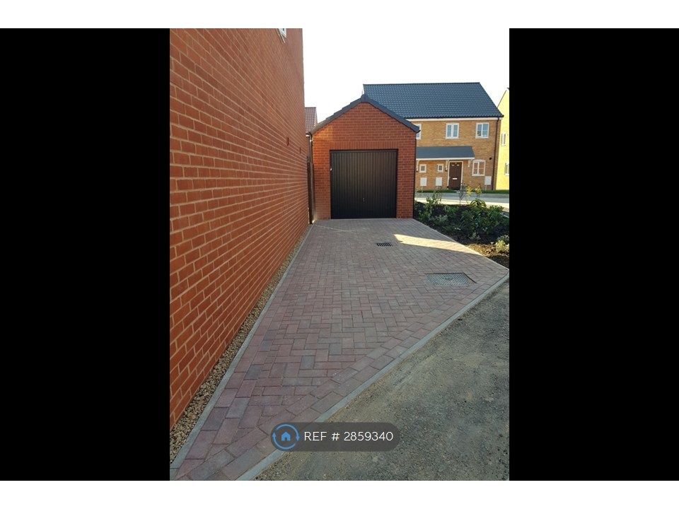 Property photo 2 of 16 Garage And Driveway