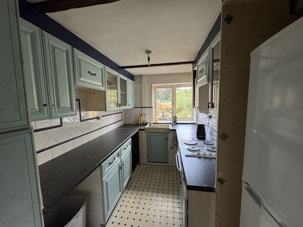 Property photo 3 of 8 Kitchen