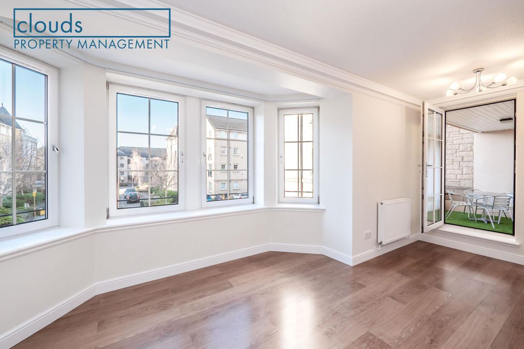 Property photo 1 of 19 Living Room Leading To Private Balcony