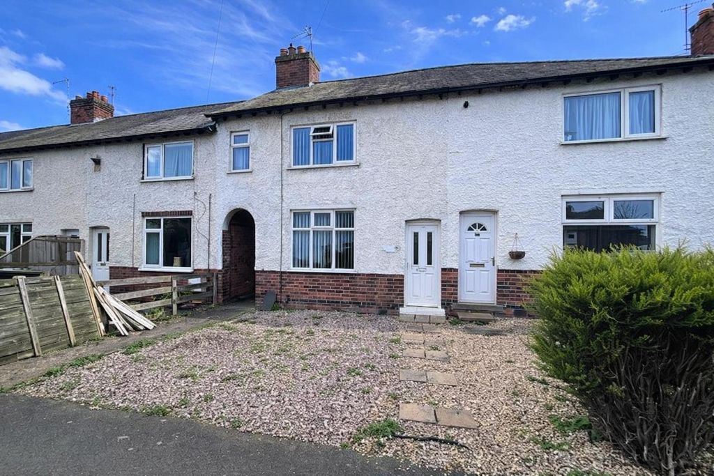 Property photo 1 of 9 Terraced Houses With Vibrant Gardens (1).Png
