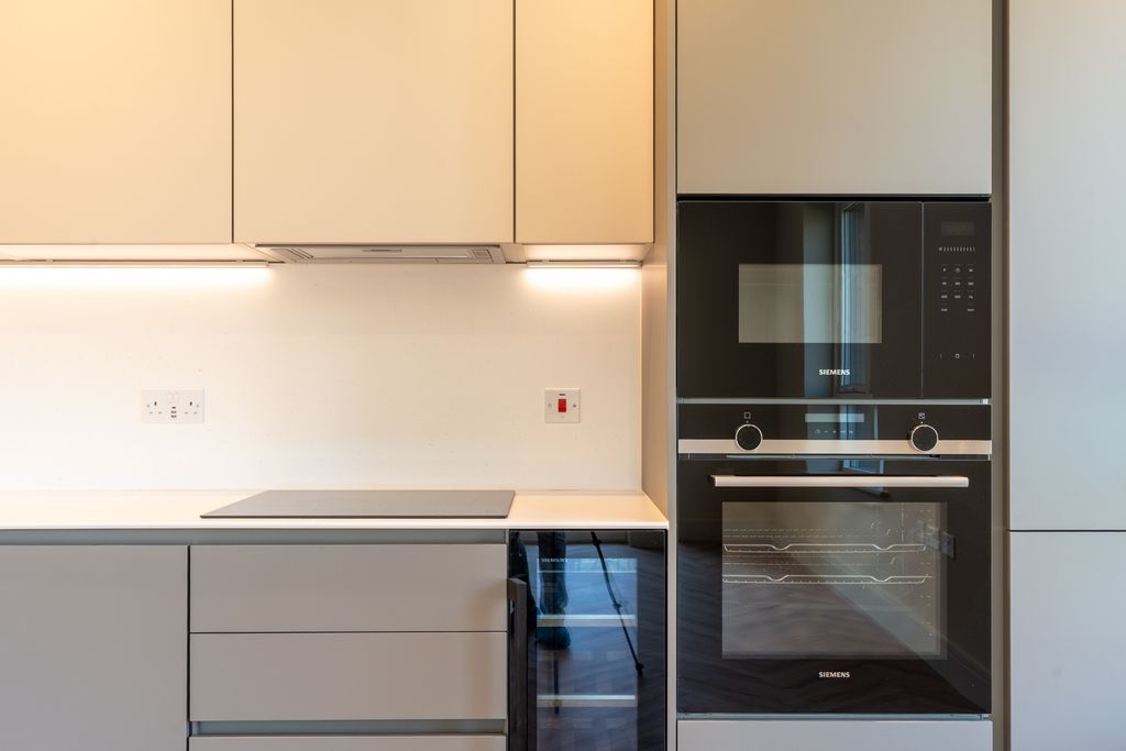 Property photo 2 of 15 Modern Kitchen Appliances; Corian Worktop