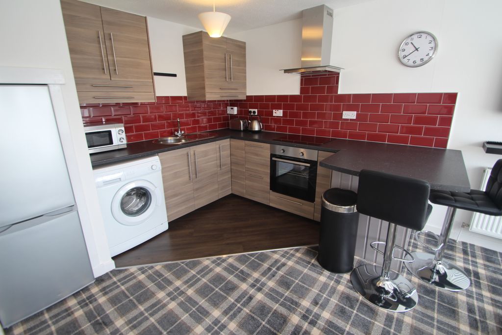 Property photo 2 of 11 Kitchen